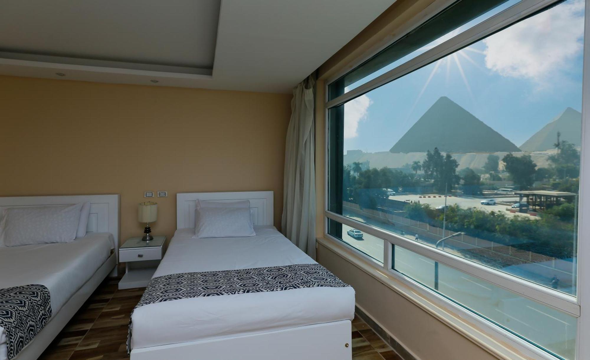 Turquoise Pyramids & Grand Egyptian Museum View Hotel Kafret el-Gabal Exterior foto